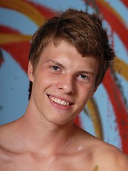 Smiley young decorator playing in studio - Gay boys pics at Twinkest.com