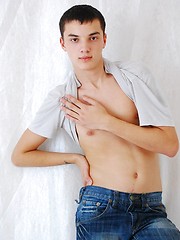 Handsome twink on the floor posing and stripping - Gay boys pics at Twinkest.com