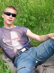 Naughty outdoor enthusiast Hubert playing with his cock on a green meadow - Gay boys pics at Twinkest.com