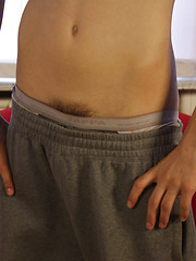 Sporty teen boy getting rid of his baggy clothes - Gay boys pics at Twinkest.com