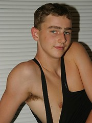 Horny twink gets naked before cameraman - Gay boys pics at Twinkest.com