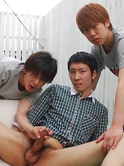 Kaede and Fuji grab the lube and a dildo and bend Jo over the small couch pulling off his shorts - Gay boys pics at Twinkest.com